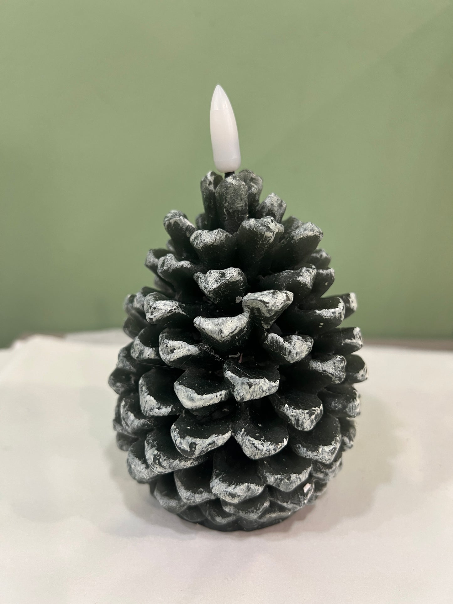 Bougie pomme de pin verte blanc chaud